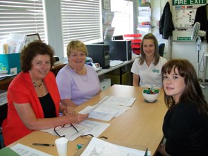 Club member Judy, President Judith and two of the students