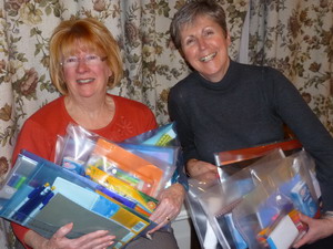 soroptimists with packages for womens refuge