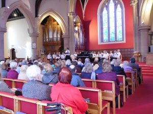 The Singers Company on stage at Sherbrooke St Gilbert's Church