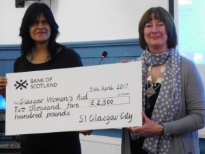 President Gwen and Shaheen of Glasgow Women's Aid with donation cheque.