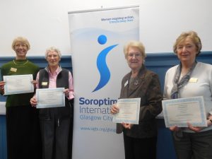 Soroptimist members with certificates