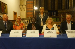 President Anne Ellis standing behind the Panel for the question and answer session during the 'Raising Awareness of Human Trafficking Event in Neath