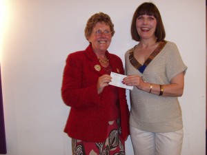 President Karen presenting cheque to June Gabbitas - area co ordinator for Project Sierra