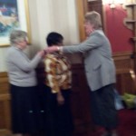 Audrey and Marion present Hilda with her chain of office