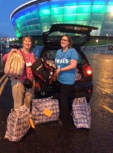 President Anne donating our backpacks for Mary's Meals
