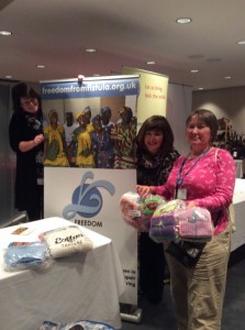 President Anne presenting knitting from SI Bangor to Freedom Fistula