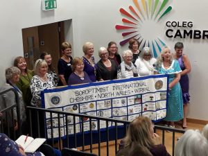 Holding the banner at Coleg Cambria