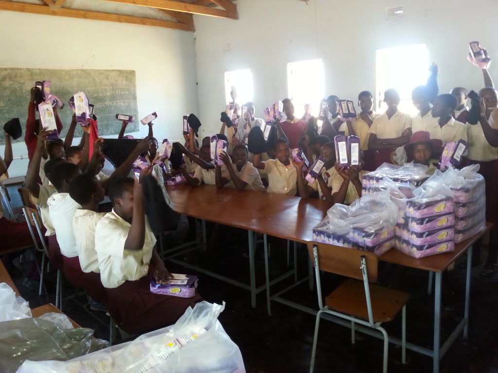 Girls at a rural school in the Bulawayo area receiving the sanitary protection that had been delivered by SI Bulawayo