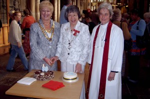 Pat Shore (SI Yorkshire President), Canon Nora Whitham MBE (SI Bradford President) and Revd Dr Frances Ward cut the cake.