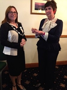 President Cathie presents President Elect Bethan with her badge of office