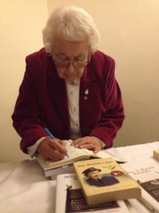 Eileen signing her books