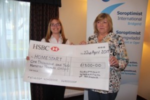 A welcome donation from SI Bridgend to Home Start Bridgend