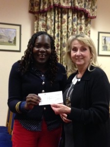 Presentation of cheque to Florence of Nowans Community Trust