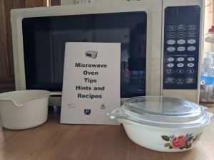 Microwave and cookery book