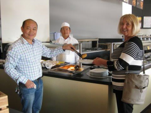 Left to right: Chung, owner of SUNA, Mani, the Chef and Sandra McCrory, member of S I Folkestone Club