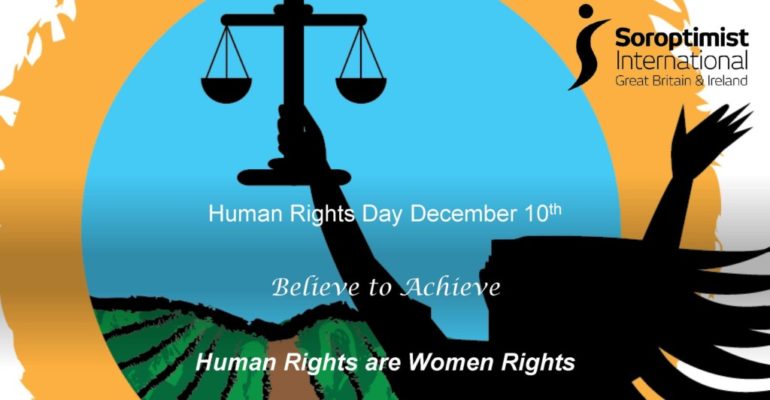 a woman holding a scales of justice - human rights are women rights