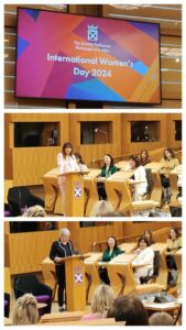 A photo collage showing a screen with the words 'International Women's Day 2024 and two images of women in the Scottish Parliament chamber.