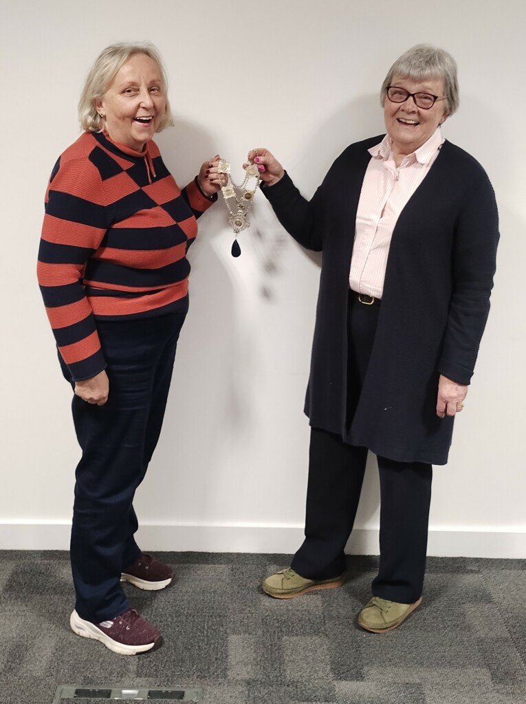 SI Glasgow City newly elected joint Presidents for year 2024-25, Liz and Margaret hold the chain of office and smile.