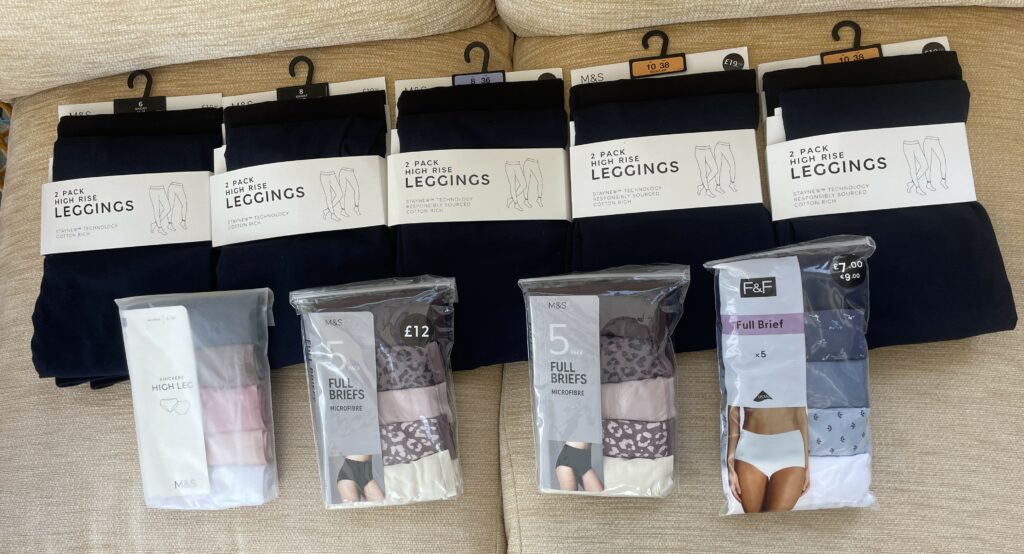Stacks of women's leggings and underwear.