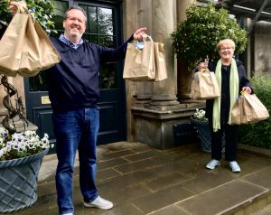 Handing over the Pamper Bags to the White Hart Hotel