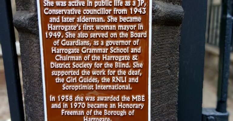 Brown Civic plaque on a gate post
