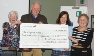 Presentation of Cheque to Michael Smith and Melanie Ewer of Courtyard Arts