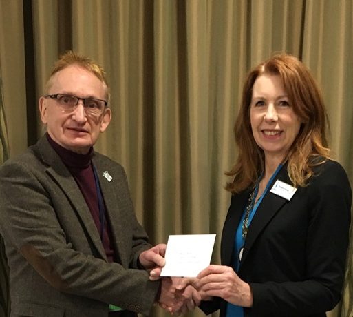 Andy Bower from Trussell Trust receiving cheque from President Sandra