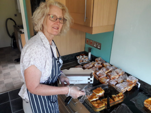 Soroptimist packing up meals