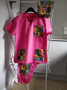 Brightly coloured pink scrubs for NHS