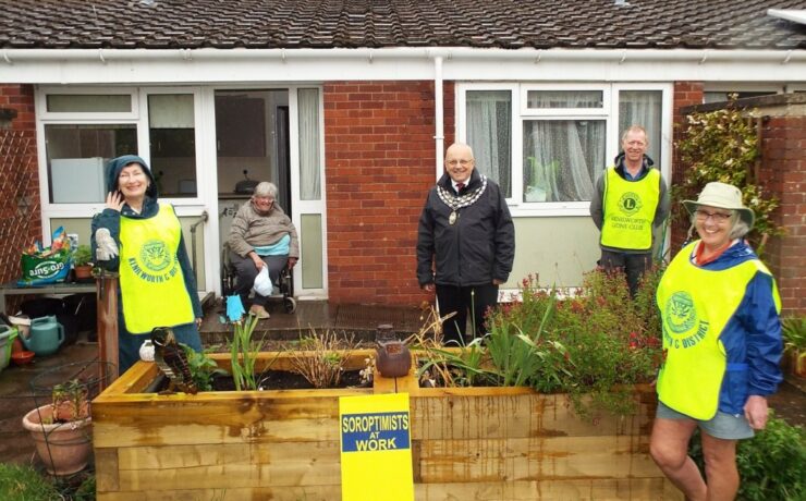 Kenilworth Town Mayor with Joan, two Soroptimists and a Kenilworth Lion around new planters