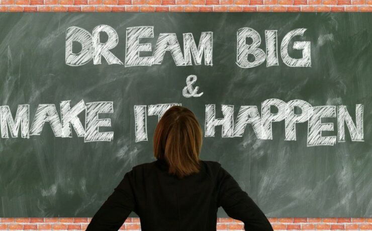Woman looking at a blackboard