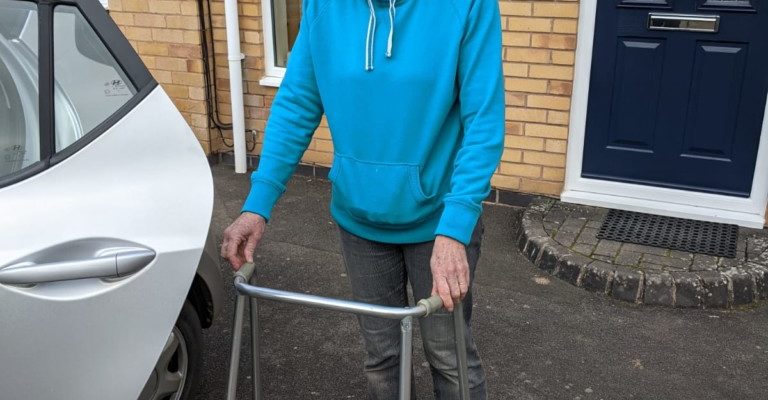 Younger woman with zimmer frame
