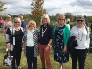 Group of smiling women at National Arboretum