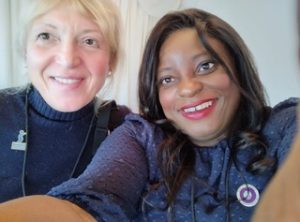Two Soroptimists, one a woman of colour