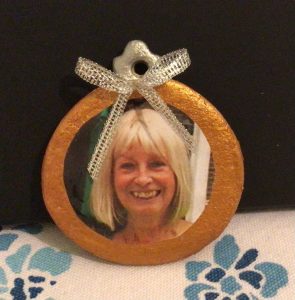 image of woman's head in an orange frame