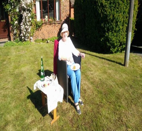 SI Member in a social distance street part for VE day 20202