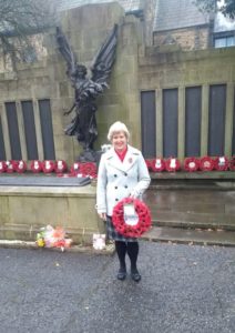 Club President holds the wreath to be laid on behalf of the Lancaster SI on Remembrance Sunday 2020