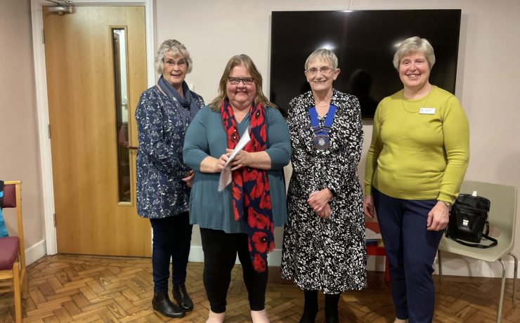 A New member being welcomed to the club