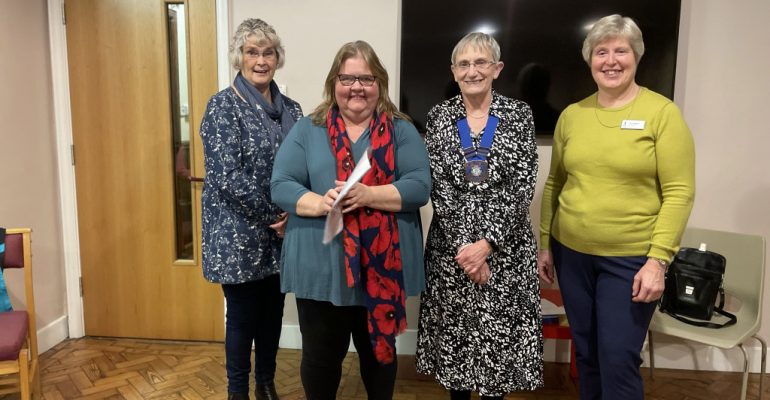 A New member being welcomed to the club