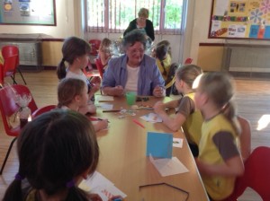 Club members Angela (foreground) and Pauline help make presents for Father's Day