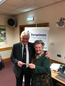 Club member Angela presenting Keith Eagland with a cheque for £855 raised at our fish and chip quiz supper held on behalf of Talking Newspapers for the Blind