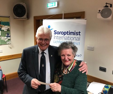 Club member Angela presenting Keith Eagland with a cheque for £855 raised at our fish and chip quiz supper held on behalf of Talking Newspapers for the Blind