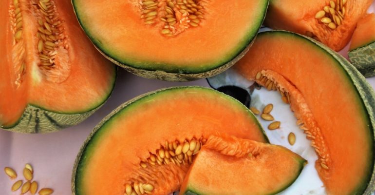 Image of melons cut in half and slices