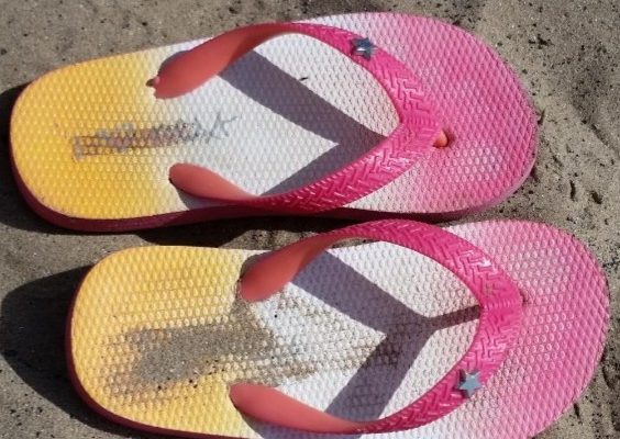 World Tsunami Awareness Day - Photo ofPhoto of Child's Flip Flops