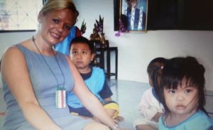 Photo of Jenny McLelland and local Thai children