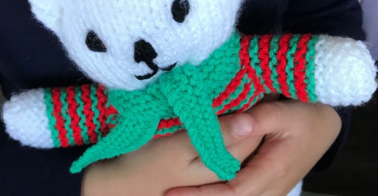 Knitted trauma in hands of a child August 21