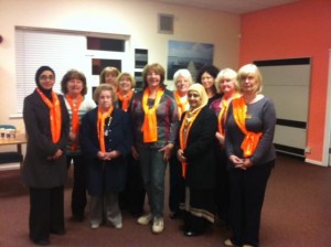 SIM Members wearing Orange