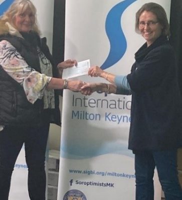 Handing cheque for £700 raised from Music event to Winter Night Shelter Oct 2021