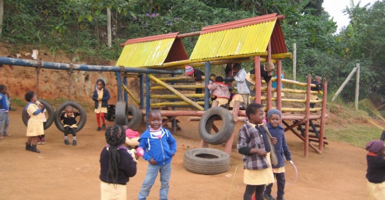 Children playing on the Jungle Gym provided through our PIES project