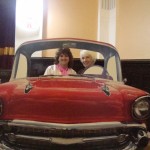 Grange Soroptimists President Lesley and Regional President Margaret pose in the car at Grease!